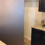 how to move a refrigerator out of a tight space